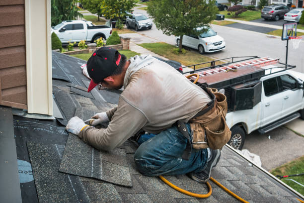 Professional Gutter Installation technician working in Dunes City, OR
